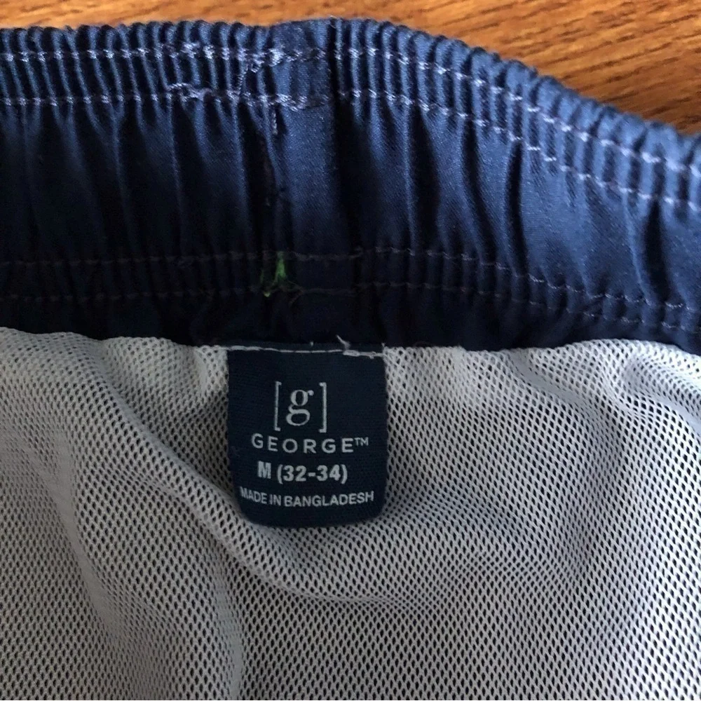 George blue swim trunks in size M (32-34)
